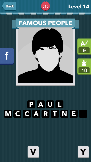 A Beatles member wearing a black turtleneck with short black